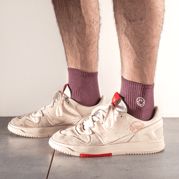 Purple smiley socks